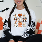 Wholesale Bookish Ghost Coquette Graphic Tee - Heather Team Purple Tee
