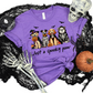 Wholesale Dog Spooky Paw Graphic Tee or Sweatshirt - Heather Team Purple Tee