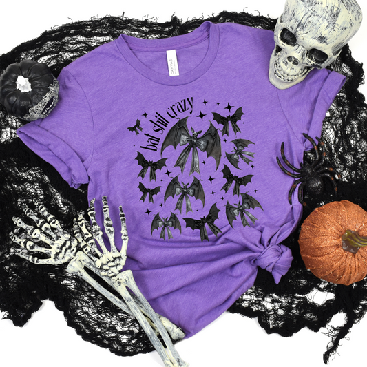 Wholesale Bat Shit Crazy Bow Graphic Tee - Heather Team Purple Tee