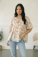 With a Rosy Glow Cream Pleated Top