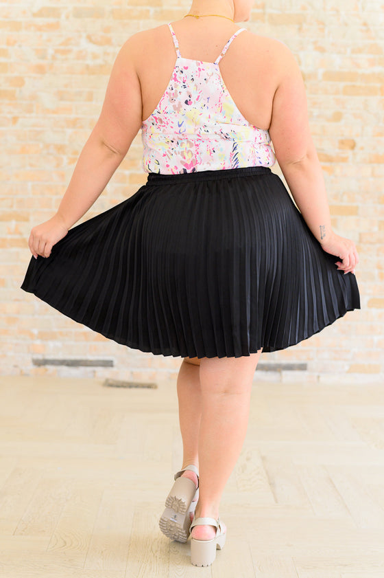 Just a Flirt Pleated Skirt in Black