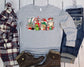 Wholesale NBC Christmas Coffee Graphic Tee - Heathered Green