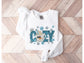 Wholesale Cozy Bling Graphic Tee - Light Blue Sweatshirt